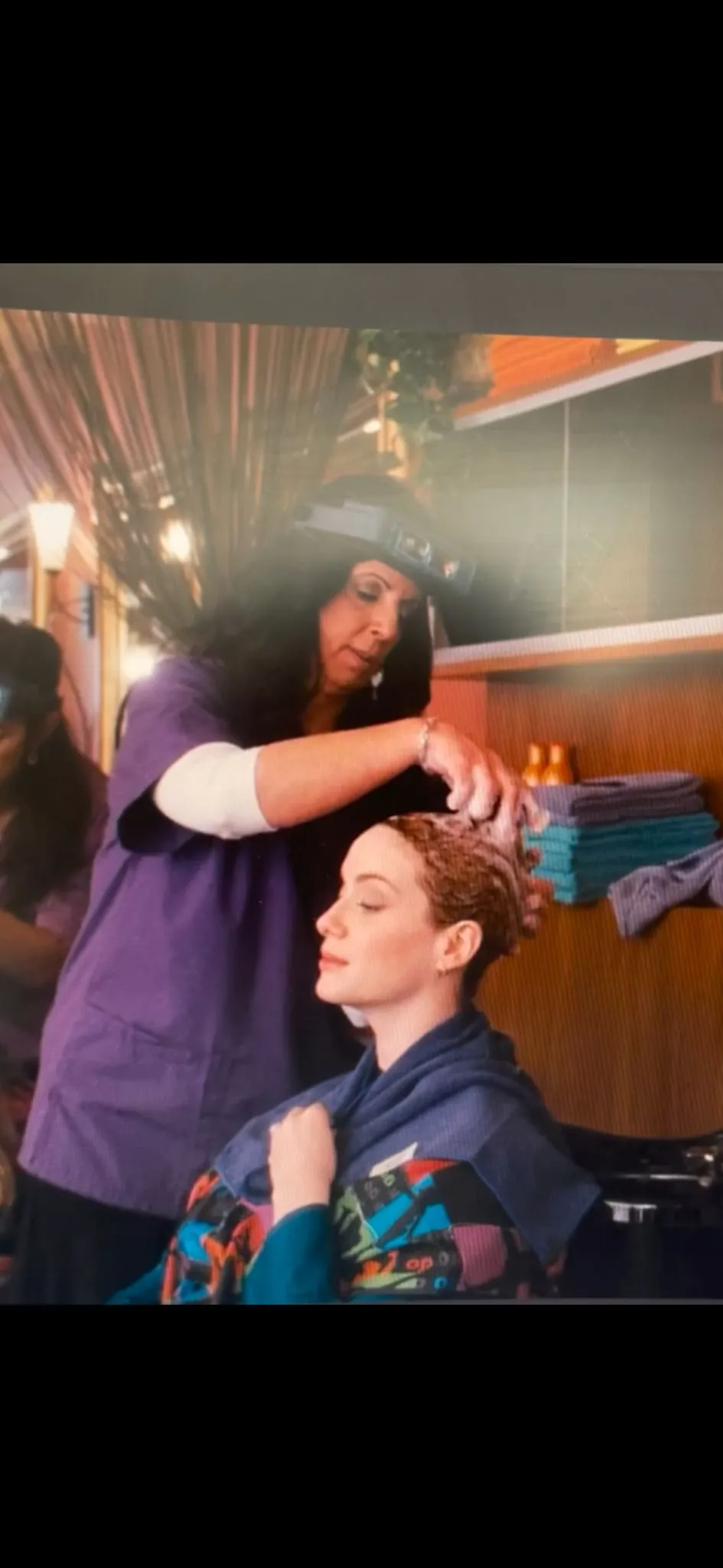 Lice Busters professional technician treating a family